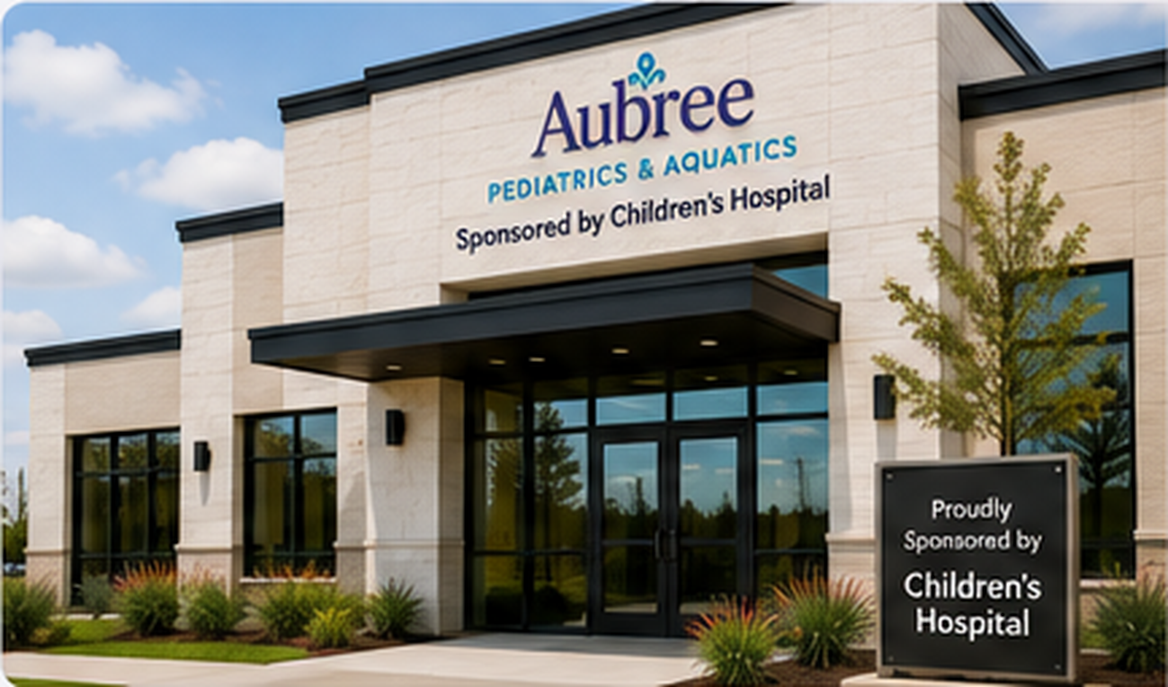 Aubree Pediatrics & Aquatics facility exterior with Sponsored by Children's Hospital signage